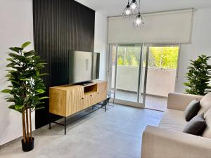 TV a/nebo společenská místnost v ubytování Apartamento Martin