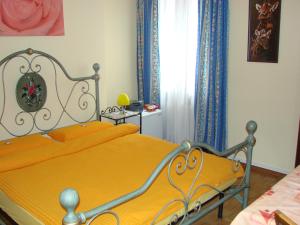 Postel nebo postele na pokoji v ubytování B&B della Pace
