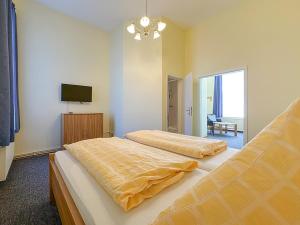 Letto o letti in una camera di Hotel Graf Waldersee