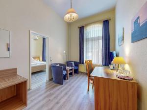 Letto o letti in una camera di Hotel Graf Waldersee