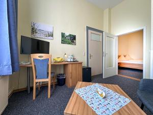 Letto o letti in una camera di Hotel Graf Waldersee