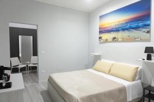 Postel nebo postele na pokoji v ubytování B&B Chiaro di Luna