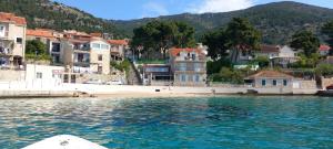 a view of a town from a boat in the water at Studio Sea view in Bol