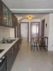Kuchyňa alebo kuchynka v ubytovaní Iro Apartments