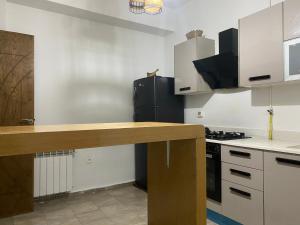 Kuchyň nebo kuchyňský kout v ubytování Appartamento di classe ed elegante