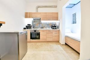 Kuchyň nebo kuchyňský kout v ubytování Cozy Flat in Central Athens - Iris