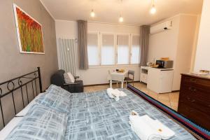 Postel nebo postele na pokoji v ubytování La casa di Ada