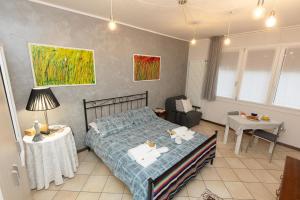 Postel nebo postele na pokoji v ubytování La casa di Ada