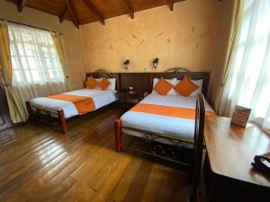 Letto o letti in una camera di Kituandes Hotel
