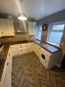 Η κουζίνα ή μικρή κουζίνα στο Allworth Close to City Center +17 φωτογραφίες