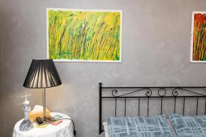 Postel nebo postele na pokoji v ubytování La casa di Ada
