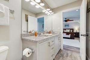 a bathroom with two sinks and a large mirror at Cranmore Road 7 in North Conway +43 photos