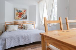 Postel nebo postele na pokoji v ubytování Apartma Roner