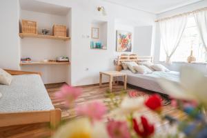 Postel nebo postele na pokoji v ubytování Apartma Roner