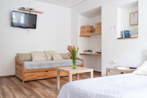 Postel nebo postele na pokoji v ubytování Apartma Roner
