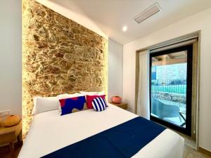 A bed or beds in a room at Morada Atlántica Még 37 kép