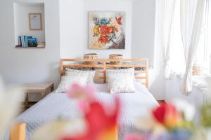Postel nebo postele na pokoji v ubytování Apartma Roner