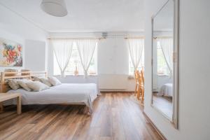 Postel nebo postele na pokoji v ubytování Apartma Roner
