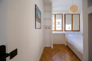 Ein Bett oder Betten in einem Zimmer der Unterkunft Superbe Appartement, vue Notre Dame de la Garde, Vieux port