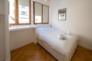 Ein Bett oder Betten in einem Zimmer der Unterkunft Superbe Appartement, vue Notre Dame de la Garde, Vieux port