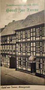 an old black and white photo of a building at Traditions - Hotel "Zur Tanne" in Wernigerode