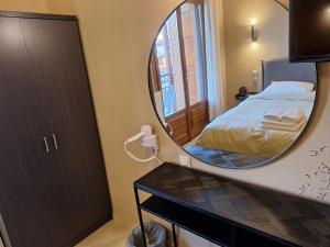 Postel nebo postele na pokoji v ubytování Skourgias Rooms