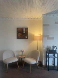 Un lugar para sentarse en Waterfront Rest B&B