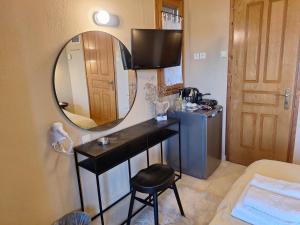Postel nebo postele na pokoji v ubytování Skourgias Rooms