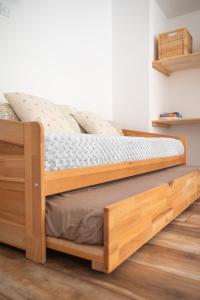 Postel nebo postele na pokoji v ubytování Apartma Roner