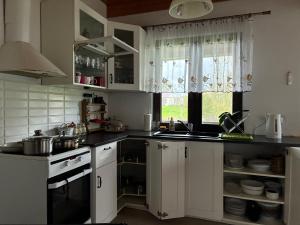 Køkken eller tekøkken på Domek nad jeziorem w Świekatowie