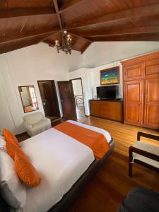 Letto o letti in una camera di Kituandes Hotel