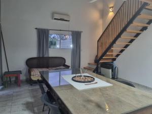 a living room with a table with a cake on it at Loft San Francisco, Cordoba in San Francisco