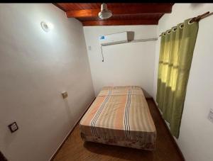 Postel nebo postele na pokoji v ubytování Cataratas Duplex Depto1