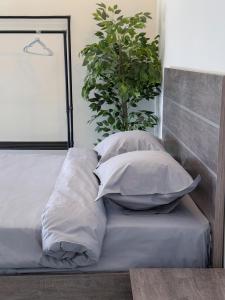 Postel nebo postele na pokoji v ubytování Caribian Hotel Yerevan