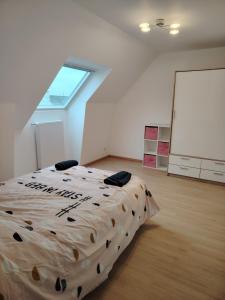 Postel nebo postele na pokoji v ubytování chambre d'hôte