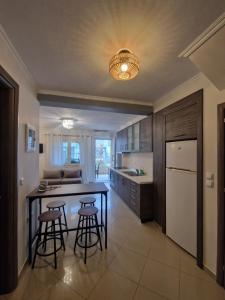 Kuchyň nebo kuchyňský kout v ubytování Iro Apartments