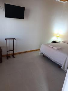 TV a/nebo společenská místnost v ubytování Departamento Alem