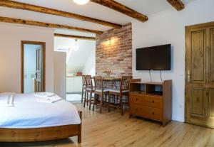 TV a/nebo společenská místnost v ubytování Terrace Apartments III