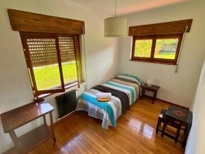 A bed or beds in a room at Chalet Las Llamas