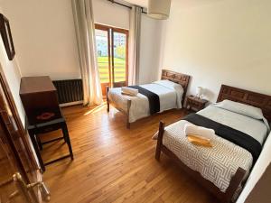 A bed or beds in a room at Chalet Las Llamas
