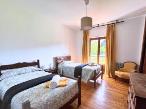 A bed or beds in a room at Chalet Las Llamas