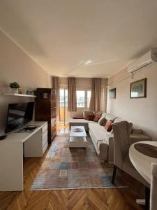 Posezení v ubytování Apartment Wellness