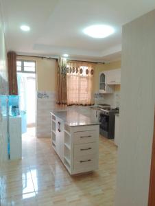 Kuchyň nebo kuchyňský kout v ubytování Membly Home + 11 fotografií