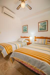 Postel nebo postele na pokoji v ubytování Apartamento Fuentes de Nerja + 29 fotografií