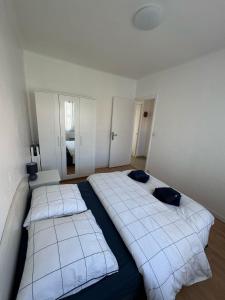 Postel nebo postele na pokoji v ubytování Maison Azur Riviera Stay