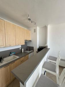 Köök või kööginurk majutusasutuses Maison Azur Riviera Stay