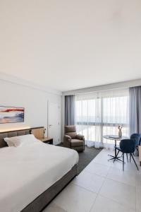 Letto o letti in una camera di The View - Saint George Hotel