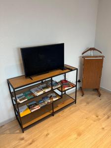 TV a/nebo společenská místnost v ubytování Appartement Orval