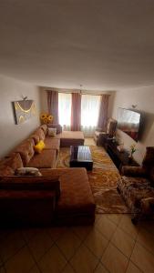 Posezení v ubytování Sarafu Homes + 4 fotografie