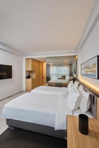 Letto o letti in una camera di The View - Saint George Hotel